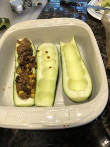 zucchini boats in baking dish