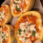 completed buffalo spaghetti squash dish topped with bleu cheese