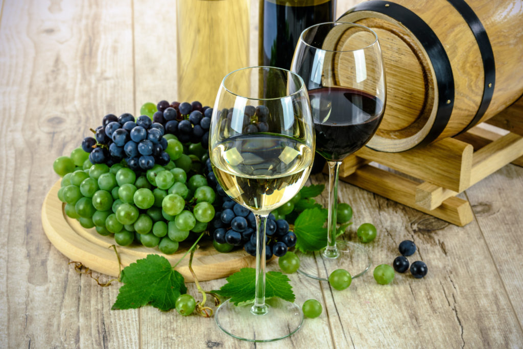 Wine barrel and glasses with wine
