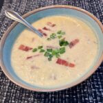 potato leek soup in a blue bowl